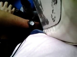 man touching woman in bus